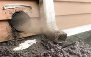 Clogged dryer vent blowing out lint buildup
