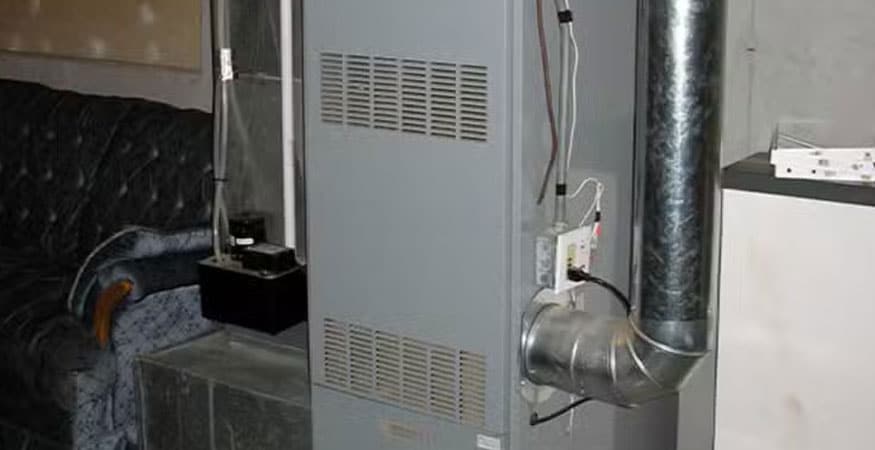 Residential furnace unit in a basement