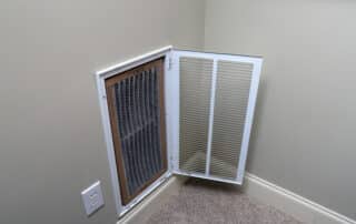Open wall air vent with visible filter